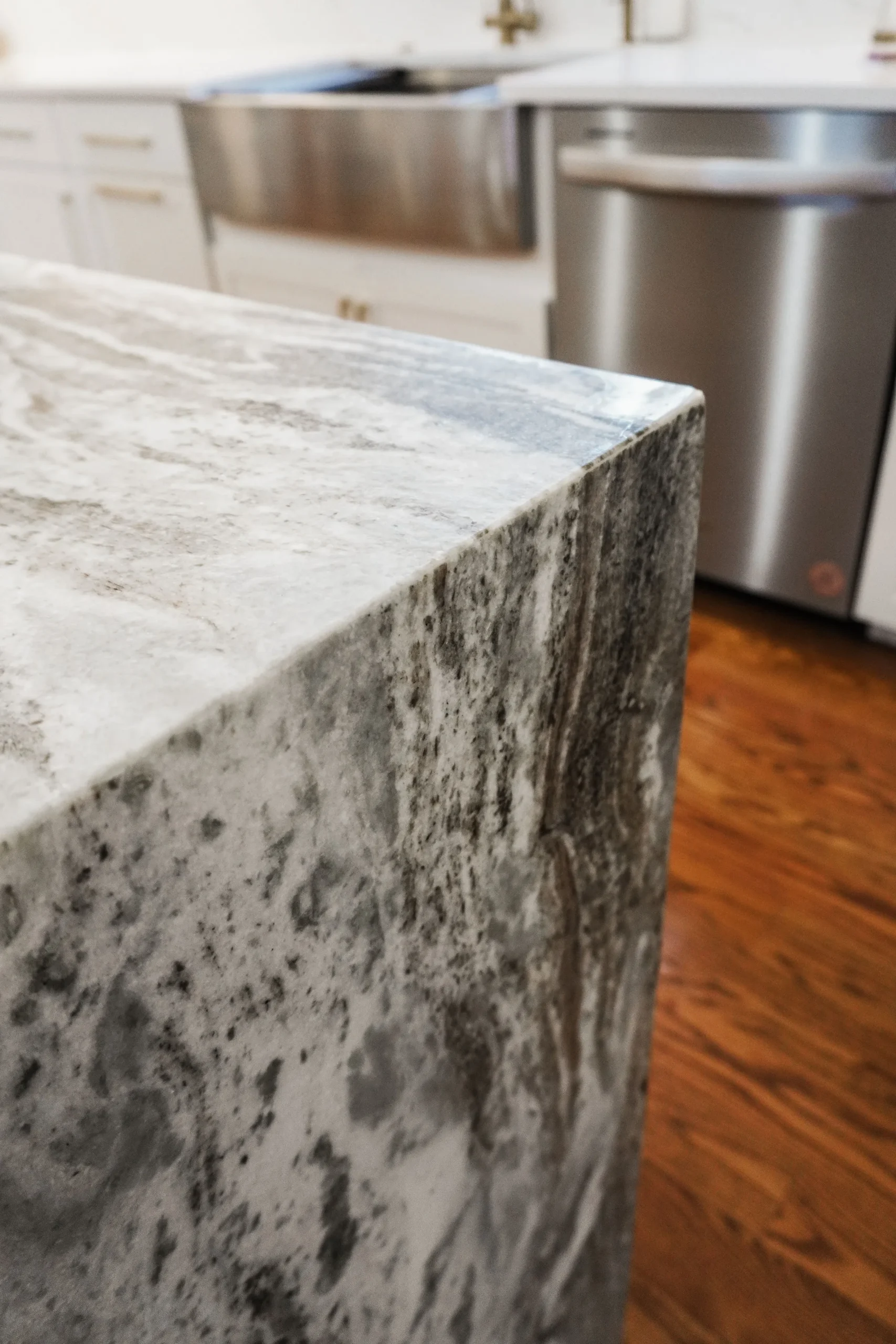 Close-up of quartz countertop demonstrating durability with a heavy object test