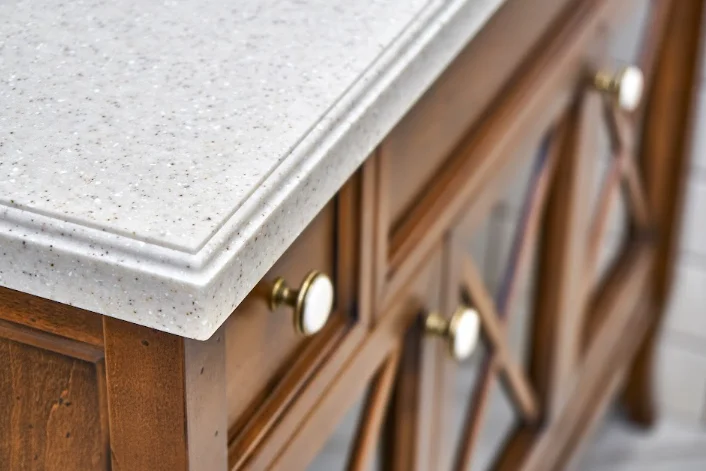 Image focusing on an edge of a classic-style countertop, representing the importance of choosing the right countertop edge styles for your project.