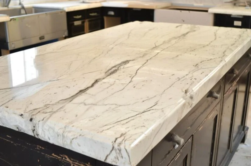 Marble countertop in a luxury kitchen, representing the beauty of natural stone countertops.